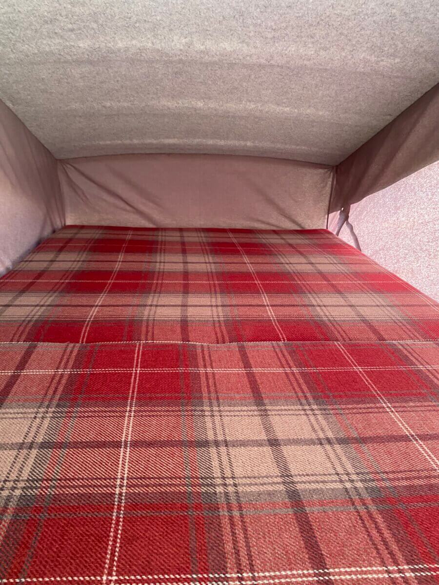Ruby's double bed in the roof