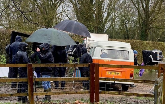 On location filming with our orange VW campervan